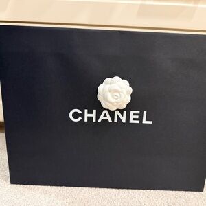 Chanel Black Bag with White Flower Accent